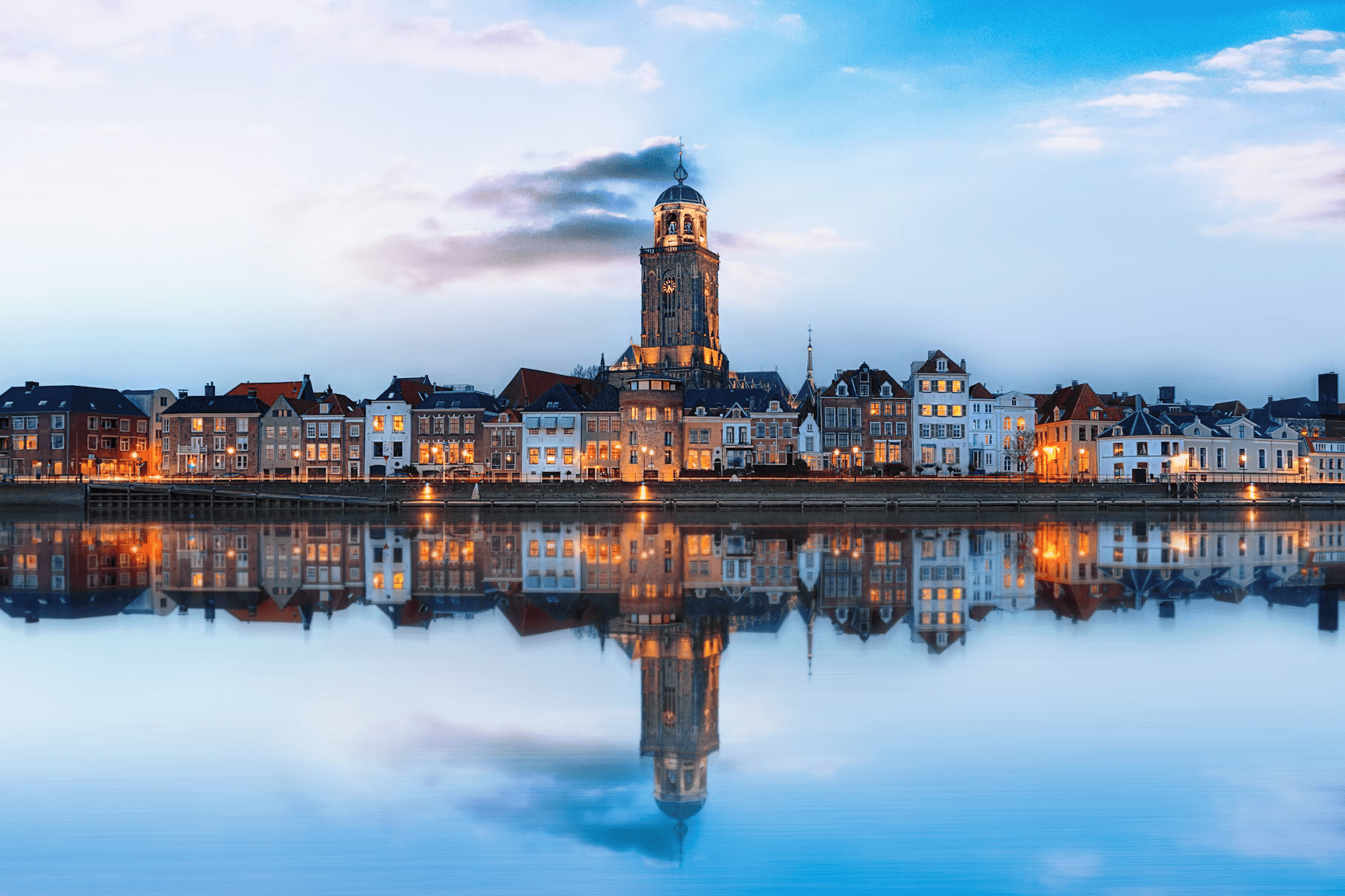 photo of the city being reflected in the water