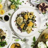 Cauliflower steaks, harissa hummus & walnuts